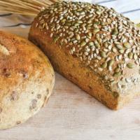 Dakota Bread · Sunflower, pumpkin, millet, and sesame seeds are generously kneaded into our honey whole whe...
