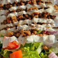 Gyro Plate Over Rice · A combination of ground beef and lamb slowly roasted on a vertical pit, thinly sliced. Serve...