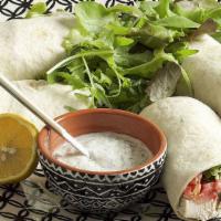 Chicken Wrap · Chicken breast marinated in saffron, lemon juice, and olive oil; wrapped in pita bread with ...