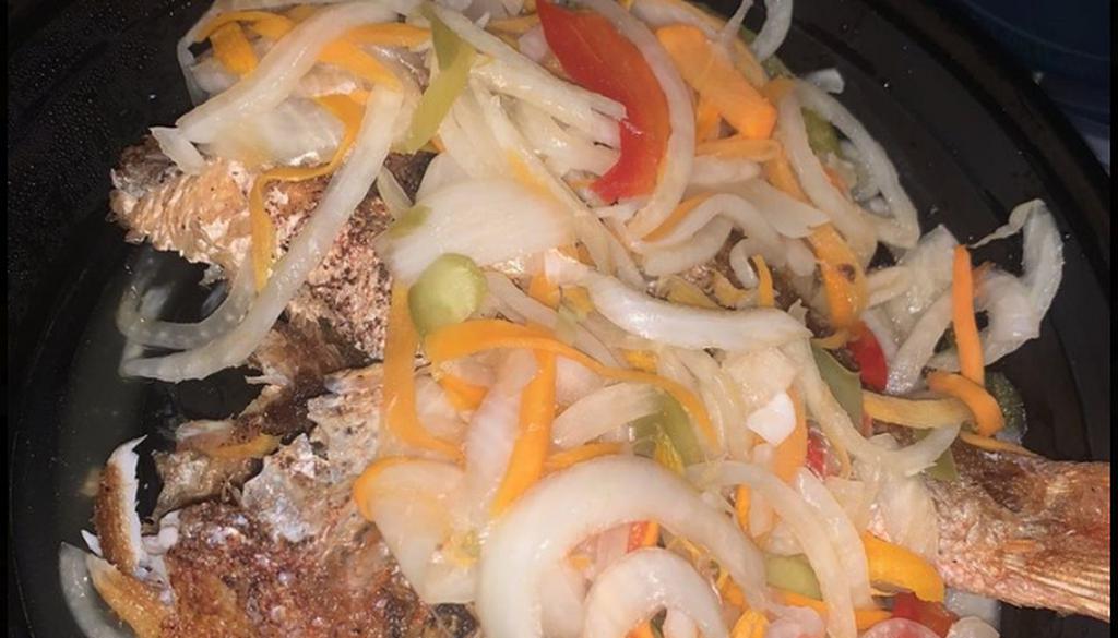 Escovitched Snapper (Vinegar Style) (Fish Only) · Whole Snapper that is fried and then stewed in a vinegar based sauce with onions, green peppers and carrots