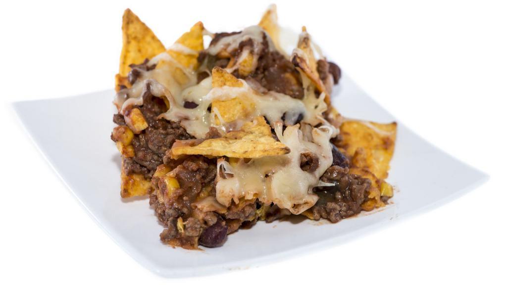 Bean And Cheese Nachos · Crispy nachos served with bean and cheese with a side of jalapeños.