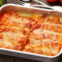 Beef Enchilada · Yummy enchilada stuffed with beef and topped with chili sauce.