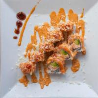 Yum Yum Roll · Salmon tempura and avocado inside, salmon, crunchy and chef's spicy sauce on top spicy.