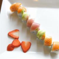 Rainbow Roll · California roll in the middle, with tuna, salmon, and avocado on the outside.