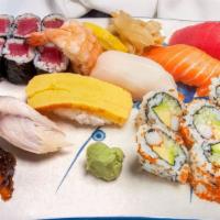 Sushi Deluxe (20 Pieces) · Combination of 8 pieces nigiri and 1 California maki and 1 tuna maki.