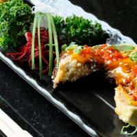 Heart Attack · Fried jalapenos with spicy tuna and cream cheese served with masago, scallion, and sesame.