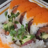 Sumo Roll · Yellowtail, salmon, tuna, avocado and cucumber topped with masago.