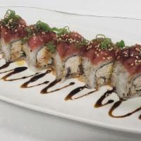 Red Dragon Roll · Baked eel, crab meat, cucumber and avocado, topped with spicy tuna, eel sauce, and spicy ray...
