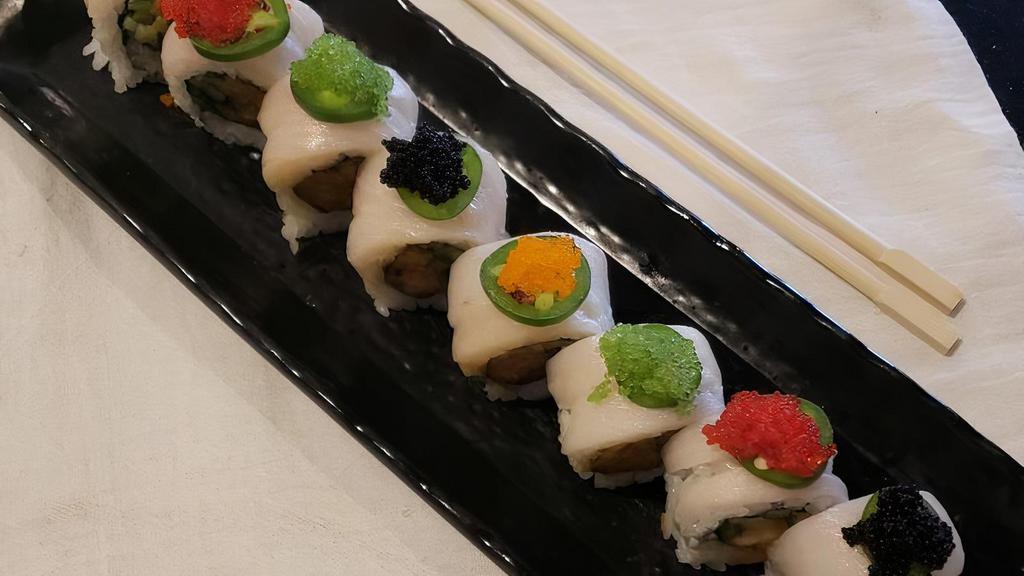 Mopac Roll · Spicy yellowtail, escolar, cucumber and Joba. Topped with escolar, jalapenos, tobiko and mustard sauce.