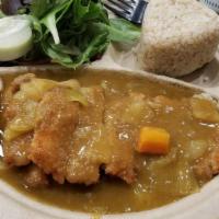 Katsu Curry · Panko (Japanese breaded crumb) breaded and fried chicken cutlet served with Japanese yellow ...
