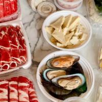 (Uncooked) Family Hot Pot Combo For Party Of 5+ · Selection of 2 Soup Base
Your Choice of Any 3 selection of sliced raw meat Plus our 3 dippin...