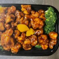 Orange Chicken · Hot and spicy. Tender chicken chunks, braised in chef's special sauce and dried orange peels.