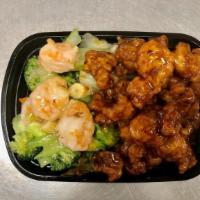 Dragon And Phoenix · Half General Tso's chicken, half pan-fried jumbo shrimp with vegetables. Two different flavo...