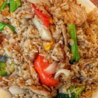 Chef'S Special Fried Rice · Egg fried rice with carrots, broccolis, bean sprouts and white onion in chef's special garli...