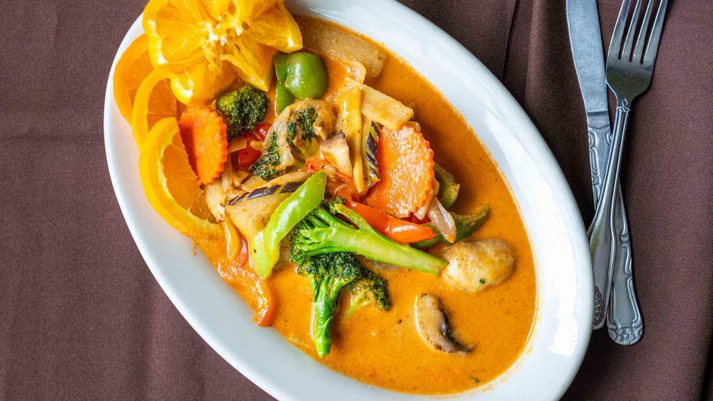 Pad Pak Curry · Fresh mushroom, carrots, eggplant, broccoli, bamboo shoot, bell pepper and white onion in a red curry and coconut milk sauce. (Dairy)