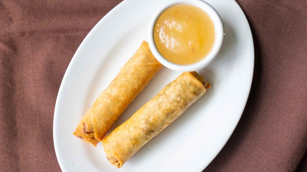 Spring Roll · Two rolls shredded cabbage, celery, carrot and bean thread noodle wrapped in rice paper. Deep-fried. Served with plum sauce.