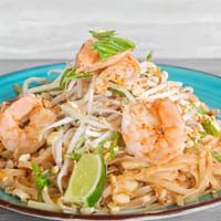 Pad Thai · Stir-fried rice noodles, tofu, carrots, cabbage & Egg in a tamarind sauce. 
Topped with bean...