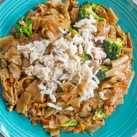 Pad See Ew · Fresh fat rice noodles stir fry in an assortment of soy sauces with broccoli, egg, onions, a...