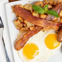 2 Eggs Any Style · Home fries, choice of bacon or sausage, white or wheat toast.