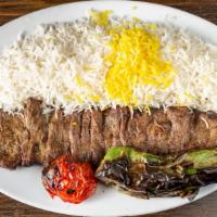 Barg Kabob · Filet mignon skewered and char-broiled to perfection with grilled tomato and bell pepper, on...
