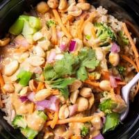 Spicy Thai Power Bowl · Steamed Brown Rice, Broccoli, Red Bell Peppers, Red Onions, Fuel Peanut Sauce, Peanuts, Fres...