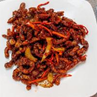 Crispy Beef  · Spicy. Crispy shredded beef sauteed with carrots and celery in hot pepper sauce.