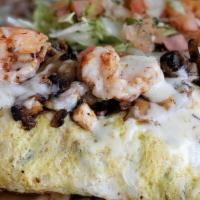 Shrimp & Mushroom Omelette · Egg & cheese omelette with grilled butterflied shrimp, mushrooms, and cheese with our house ...