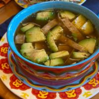 Tortilla Soup · Delicious Mexican soup with tomatoes, onions, cilantro, crispy tortilla strips, and avocado....
