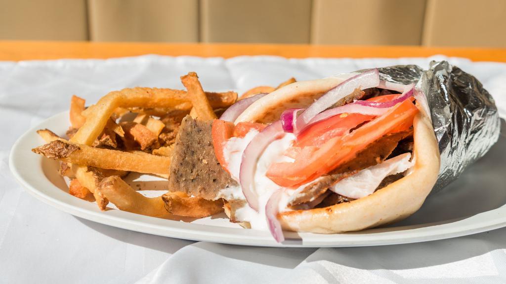Original Gyro · Specially seasoned lamb and beef cooked slowly on a vertical broiler, sliced thin and served with pita bread, tzatziki, onions, and tomatoes.