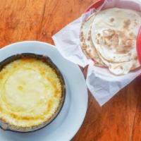 Fundido  Solo Queso · melted jack cheese, flour tortillas
