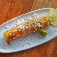 Elote Placero · Grilled corn on the cob with valentina aioli, chili powder and queso fresco.