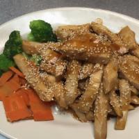 Sesame Chicken · Lightly batted chicken deep-fried and coated with special sesame sauce and sesame seeds on t...