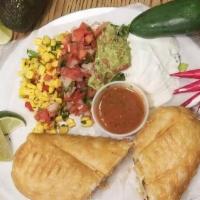 **Chimichanga (Fried Burrito)** · Deep Fried Burrito. Choice of Meat, beans, rice, cheese.  Choice of Sides: lettuce, pico de ...