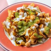 Chaat Papri · Flour chips, pieces of steamed potato and chick peas, topped with delicious mixture of tamar...