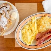 Santa Fe Breakfast Combo · Santa Fe cafe specialties. Choice of two pieces of french toast, one waffle or two fluffy pa...