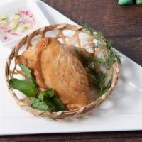 Curry Puff · Curry Fried Pastry. Served with Cucumber sauce. Add Chicken for $1