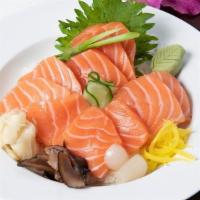 Sake Don · An Abundance of Fresh Salmon Sashimi with Pickled Veggies over a bed of Sushi Rice