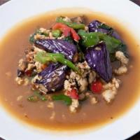 House Eggplant With Ground Chicken · Ground Chicken & Eggplant Stir Fried with Thai Basil, Thai Chilis, Garlic, & Bean Sauce. ser...