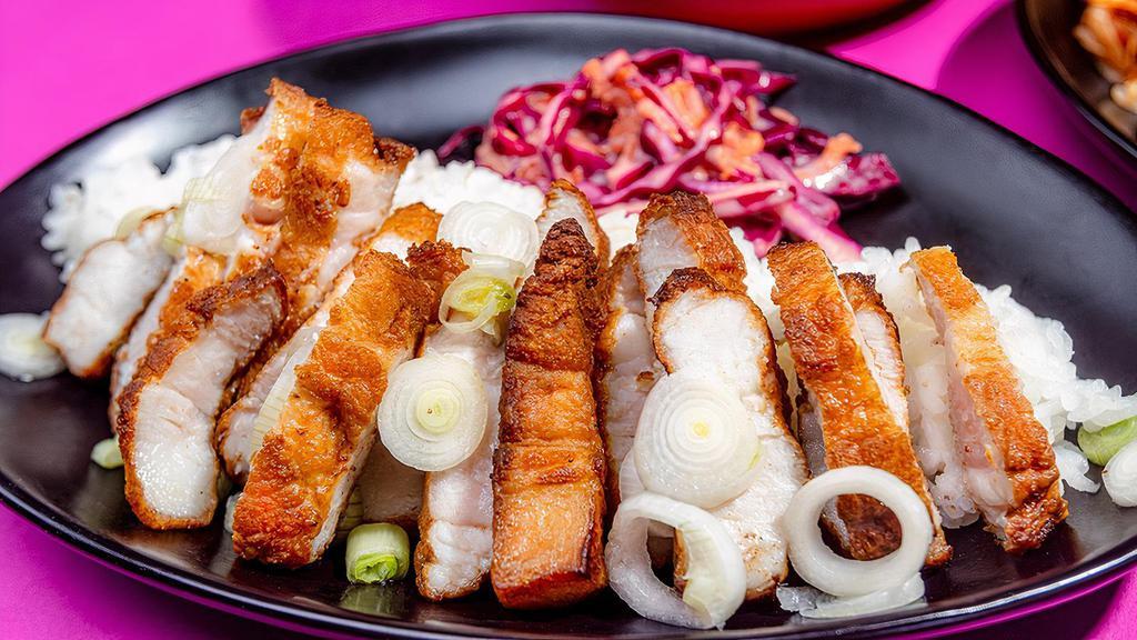 Spicy Oriental Crispy Pork Belly Bowl · Twice cooked Spicy Pork Belly. Perfectly seasoned with garlic, honey, and our secret chili blend and spices for a decadent dish that will have you craving for more. Served with pickled onions and red cabbage.