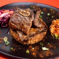 Galbi Stacker (3) · Galbi tastes better on top of a crunchy rice base, a delightful Stacker served with coleslaw...
