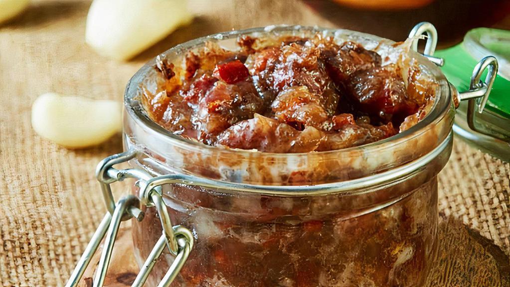 Bacon And Onion Marmalade · Bacon and onions cooked with red wine and bourbon for our unique recipe. Make sure you order extra.