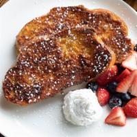 Challah French Toast · thick cut challah, fresh berries, whipped cream, powdered sugar, michigan maple syrup