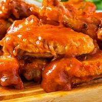 Chicken Wings · Jumbo chicken wings or battered boneless . wings. Served with celery, blue cheese or . ranch.