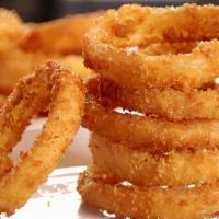 Steakhouse Onion Rings · Served with Boom Boom Sauce