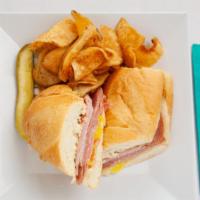 Super Club · Smoked turkey, Virginia ham, applewood smoked bacon and swiss cheese. Served on a freshly ba...