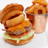 Just A Burger · Half pound angus beef cooked to order, lettuce, tomato, red onion and mayonnaise. Served on ...