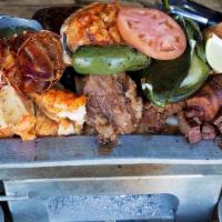Deluxe Parrillada (Lobster Tail, Chile Relleno, Fried Mushrooms) · Beef, chicken and shrimp fajitas. With rice and beans, sour cream, pico de gallo, cheese, su...