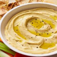 Hummus · A dip made from cooked and mashed chickpeas blended with tahini, garlic and lemon juice. Mad...