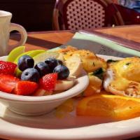 Eggs Florentine · Turkey, spinach, and poached eggs served on an English muffin and topped with hollandaise sa...