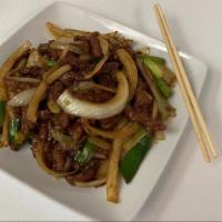 Mongolian Beef With Scallions / 蒙古牛 · Served with white rice.